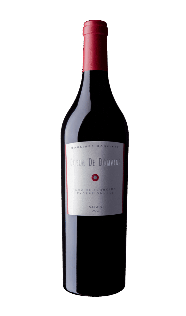 Bottle of Cœur de Domaines red wine from Domaines Rouvinez, AOC Valais, with a Bordeaux capsule